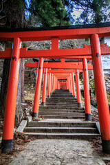 Red Torii Gate Pathway Leading Upward in Arikoyama Inari Shrine, Izushi, Japan
