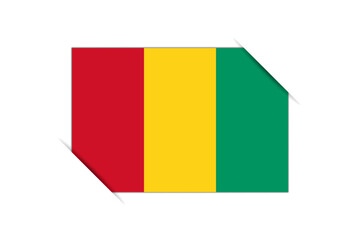 Guinea flag - rectangle colorful flag representing a country cultural identity and heritage. The essence of national pride and unity. Attached by the corners in a paper album