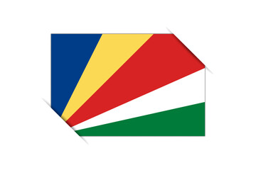 Seychelles flag - rectangle colorful flag representing a country cultural identity and heritage. The essence of national pride and unity. Attached by the corners in a paper album