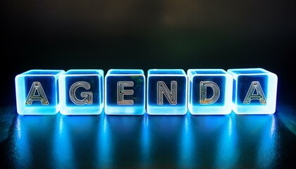 英単語のAGENDAの文字が書かれた透明なキューブブロックが横に並んでいる。aiで生成	
