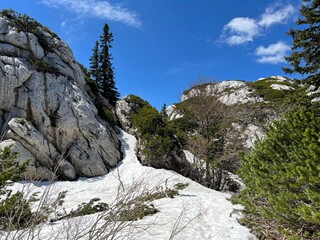 The last remnants of spring snow after a long and harsh mountain winter - Northern Velebit National...