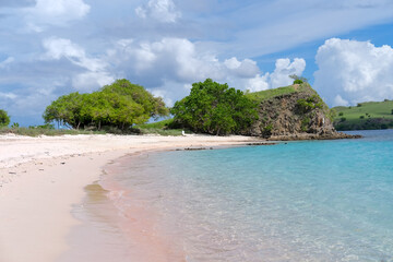 Pink Beach in the summer, famous for its unique pink sand and clear water, surrounded by breathtaking landscapes and vibrant marine life, Komodo National Park, Indonesia
