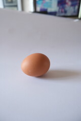 Fresh Brown Chicken Egg on White Background Perfect for Mockup and Design Projects