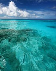 Caribbean seascape with clear ocean waves water and white restful cloudy skies