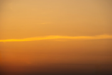 Enjoy a panoramic view of the skyline. The sun rises in the morning sky with colorful clouds. and beautiful cloud patterns In the soft light of the morning	