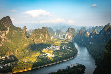 beautiful karst landscape of yangshuo, china, river li, bending river, sunset, hills, view from...