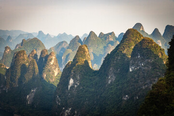 beautiful karst landscape of yangshuo, china, river li, bending river, sunset, hills, view from...