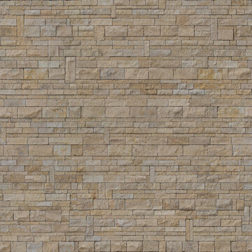 Stone texture of stacked yellow limestone wall cladding seamless pattern