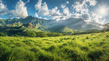 Obraz premium Majestic Mountain Landscape with Lush Green Fields, Dramatic Sky, and Sunlight Streaming Through Clouds in a Serene Natural Environment