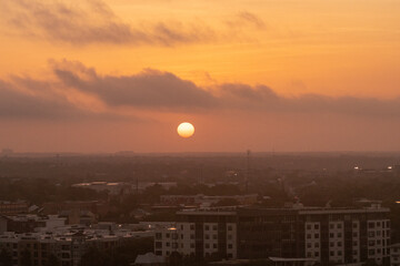 The Sun rises over Austin, Texas, USA during a dangerous Summer heat wave that has been straining the power grid and causing brownouts and electrical shortages on the ERCOT power grid 