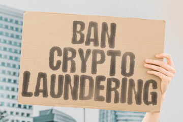 The phrase 'Ban Crypto Laundering' emphasizes eliminating illegal financial activities. Security,...