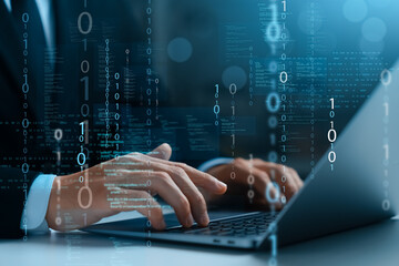 Programmer and cyber security technology, male programmer uses laptop for software development,...