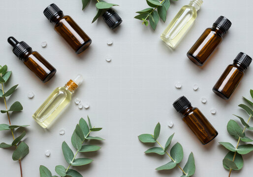 Natural Healing: Essential Oils and Eucalyptus Leaves with Space for Text