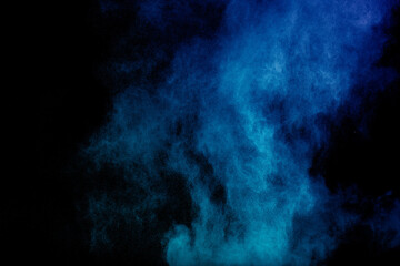 Green Color Powder Explosion Cloud On Black Background. Green Dust Splash On Dark Background.