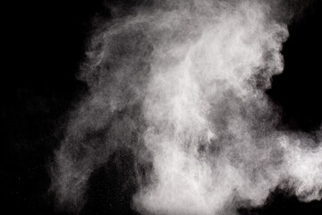 White Dust Cloud Explosion on Dark Background.Ethereal White Powder Dispersal.