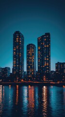 Naklejka premium Urban skyline at twilight with illuminated modern apartment buildings