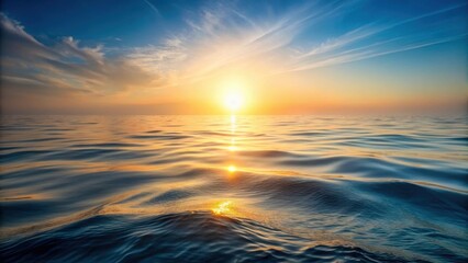 Obraz premium Softly glowing sunlight breaks through morning mist on a serene ocean surface, creating gentle ripples and subtle waves , wave