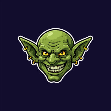 The image showcases a cartoon goblin head with a wicked smile, pointed ears, and piercing yellow eyes against a dark background.