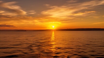 Naklejka premium Golden Sunset Over Calm Ocean Waterscape