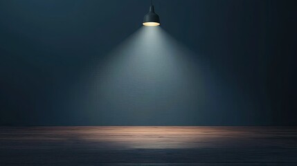 Elegant and minimalist table setup with a smooth blue wall and soft spotlight for winter branding mockups or product presentations.