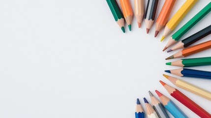 Fototapeta premium Vibrant Colored Pencils Arranged in a Circular Pattern on a White Background, Perfect for Artistic Creations and Creative Projects Display