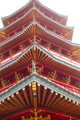 Close-up view of a meticulously crafted roof structure, likely part of an Asian pagoda or temple.