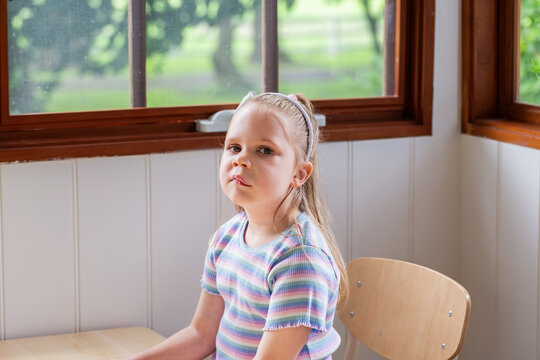 Girl with speech disability caused by lymphatic malformation genetic condition at speech pathology