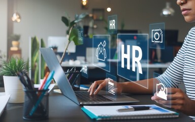 Person using laptop for human resources management