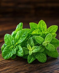 [Closeup photo of fresh mint leaves on wood] Fresh Mint Leaves Close-up on Wooden Surface