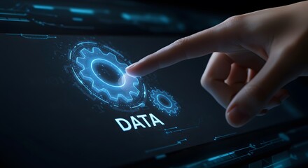 Data driven technology concept with a digital finger interacting with data symbol on futuristic blue holographic interface representing analytics and information processing in modern business