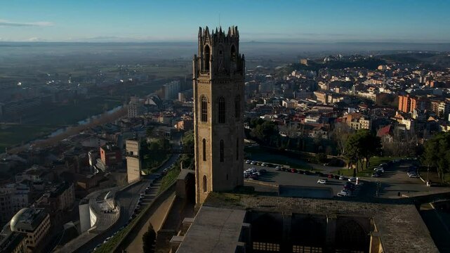 Majestic old cathedral on top of the hill and sorrounded by the city of Lleida in Catalonia, Spain. High quality 4k drone footage