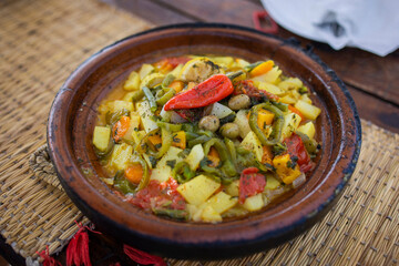 Vegetable Tagine in Ceramic Pot on Woven Mat