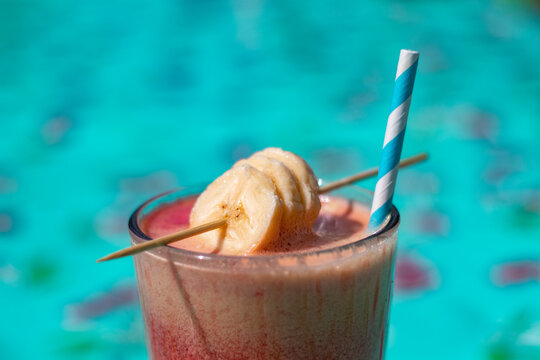 a natural juicy of bannana and orange with a strow