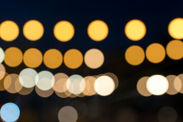 Abstract yellow orange bokeh background, background with orange bokeh, golden lights, Holiday backdrop 