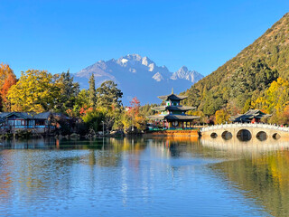 Black dragon pool in Lijiang Ancient Town with best views of Jade Dragon Snow Mountain. Famous...