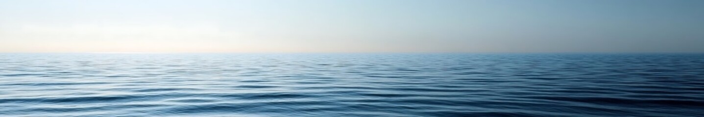 Calm and serene sea with no disturbances, perfect natural landscape with a high-definition view and clear sky, captured with master-level photography. A tranquil and peaceful scene evoking relaxation 