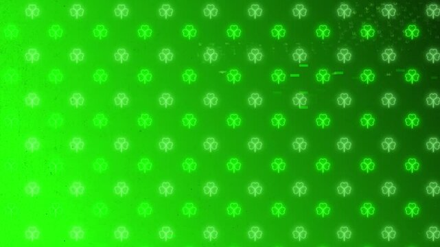 Green Neon Clover Background in seamless loop. Glitchy Irish St Patricks Overlay with transparent Background. 