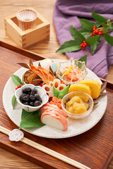 美しく盛り付けられたワンプレートおせち – お正月を彩る一口サイズのおせち盛り合わせ