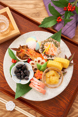 美しく盛り付けられたワンプレートおせち – お正月を彩る一口サイズのおせち盛り合わせ