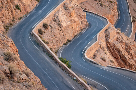 Curving, winding road in moroccan mountains - Powered by Adobe