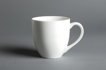 Fototapeta premium White blank mug for mock-up on the outside on the table in the garden