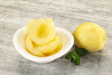 Canned yellow pear with syrup