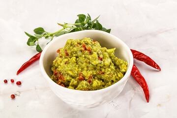 Guacamole with avocado, tomato and chili