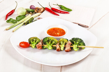 Thai Street foof satay with bacon and broccoli