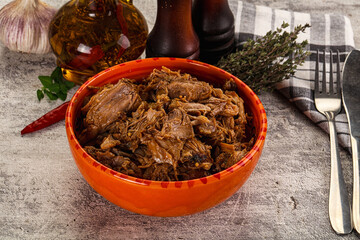 Shredded slow cooked pork meat