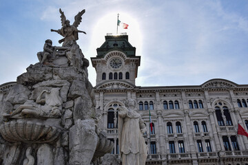 Obraz premium Trieste city hall and Fontain of the four continents at Piazza Unità d'Italia (Unity of Italy Square) at Trieste, Italy