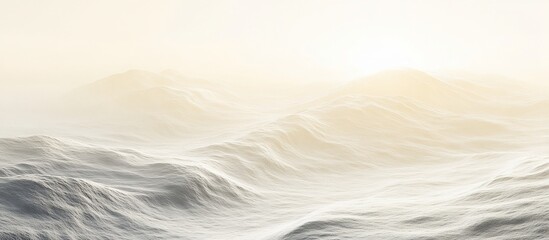 Soft, hazy light illuminating gently rolling hills.