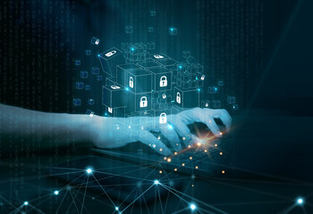 Blockchain Technology and cyber security Concept. A man is using a laptop to access blockchain...