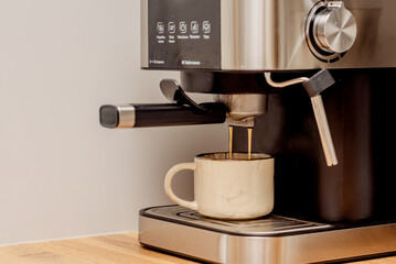 The process of making coffee at home. Coffee machine. Ground coffee.