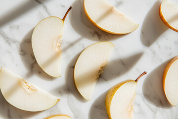 arranged pear slices, artistic composition, marble surface